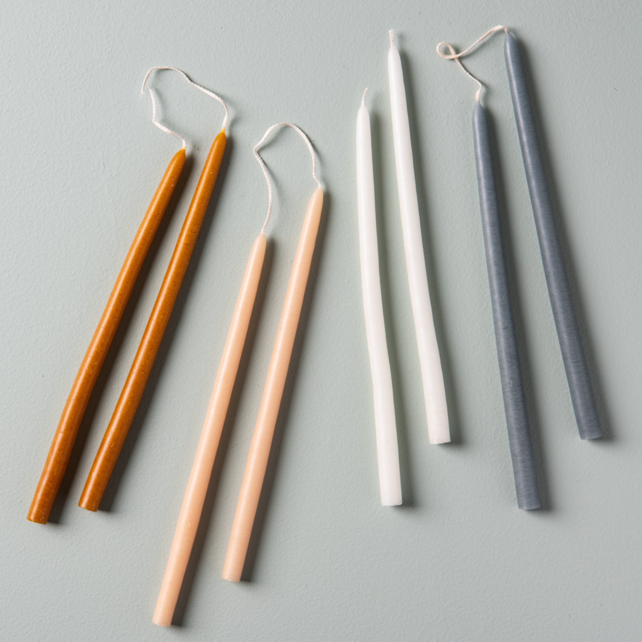 10" handmade skinny taper candles in various colors On sale for $1.95, discounted from $2.60