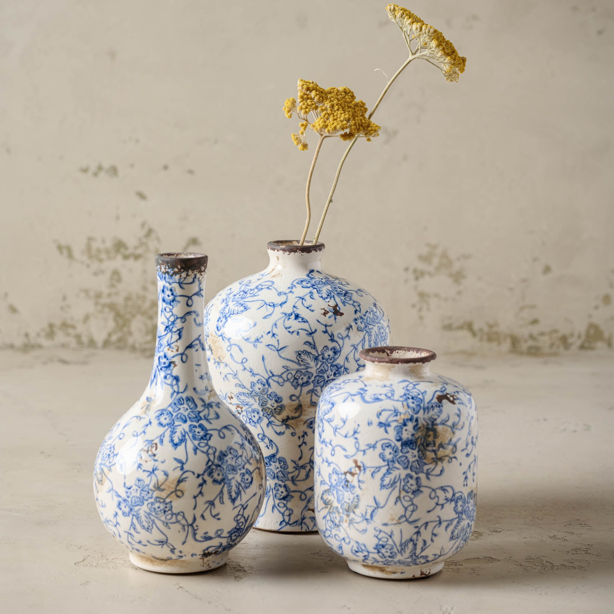 Blue and White Distressed Vase On sale for $14.99, discounted from $26.00 to $46.00