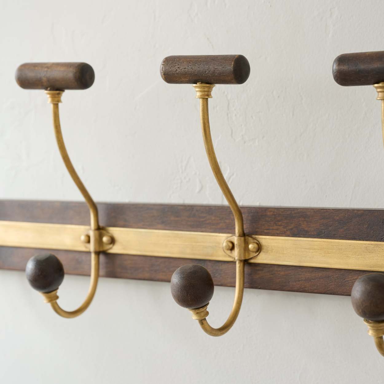 Grant Wood and Brass Hook Rack