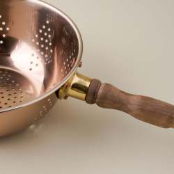 Copper Colander with Walnut Handle close up of handle