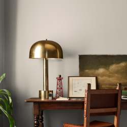 medium grey with tan interior paint named gatherings shown painted on bedroom wall
