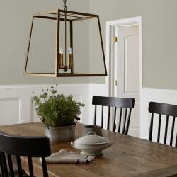 Warm chalky pale green interior paint named flower jar shown painted on dining room wall