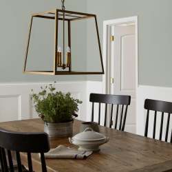 Frosty mint green with beige notes interior paint named early riser shown painted on dining room wall