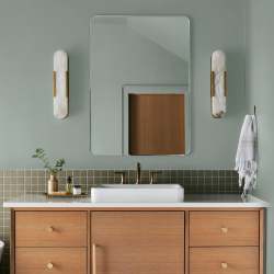 Creamy mint green interior paint named freshly cut stems shown painted on bathroom wall