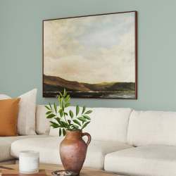 Creamy mint green interior paint named freshly cut stems shown painted on living room wall