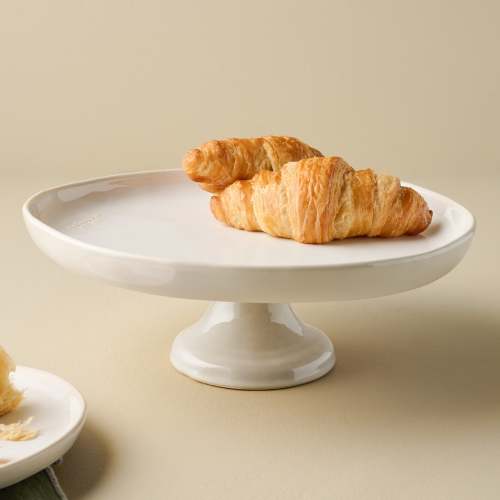 Magnolia Est. Cake Stand in use with croissants On sale for $29.99, discounted from $42.00