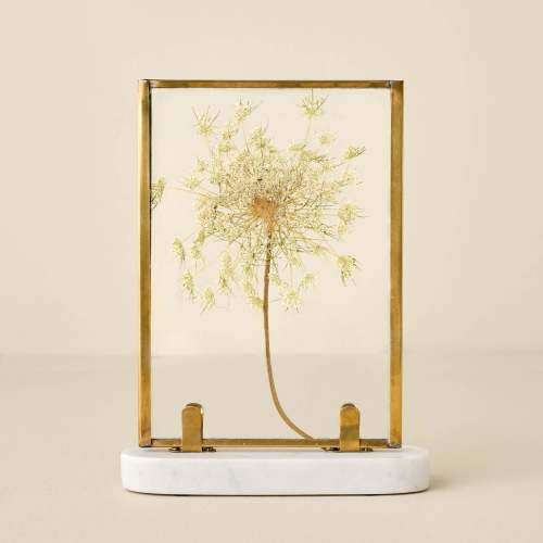Antique Brass Bracket Photo Frame with a pressed floral inside $18.00