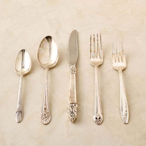 magnolia vintage flatware set including fork, knife, and spoon $40.00