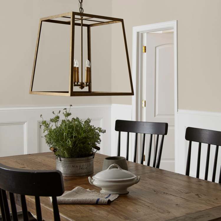 medium grey with tan interior paint named gatherings shown painted on dining room wall