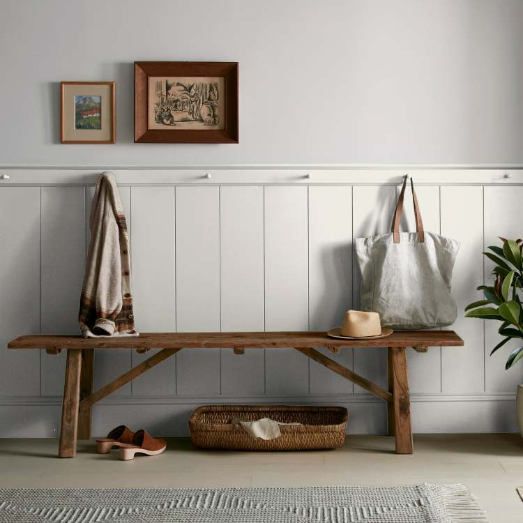 creamy weathered white interior paint named shiplap shown painted on entryway wall
