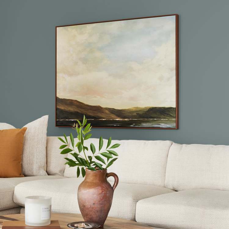deep muted blue with grey undertones paint named duke gray shown painted on living room wall