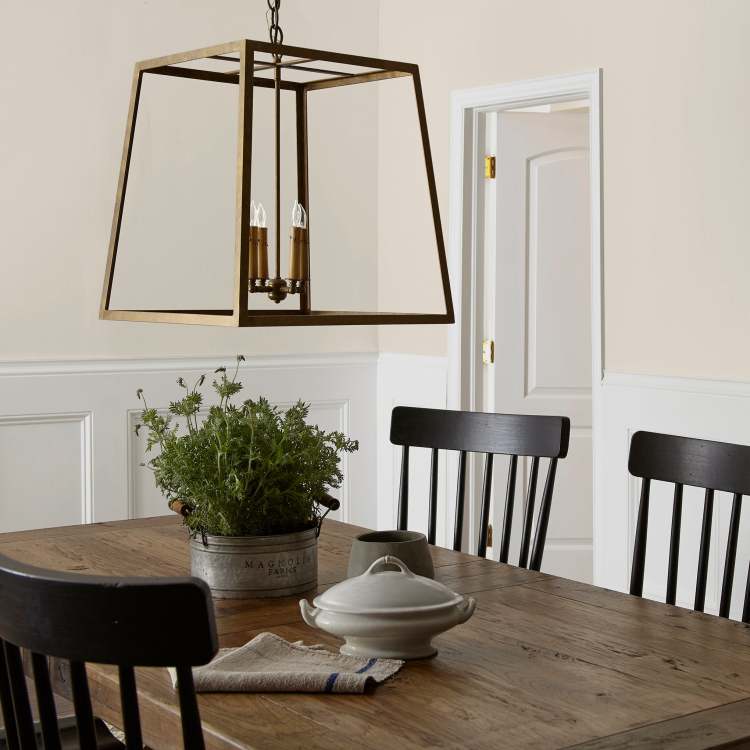 Warm beige interior paint named blanched shown painted on dining room wall