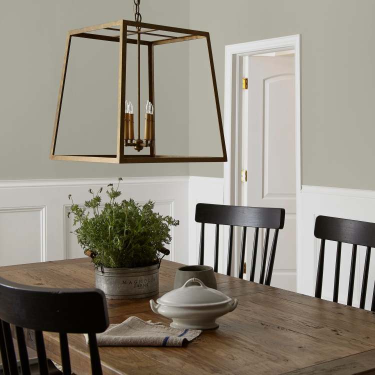 Warm chalky pale green interior paint named flower jar shown painted on dining room wall