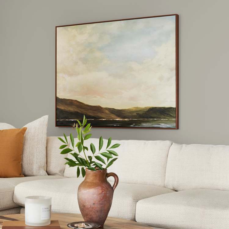 Warm chalky pale green interior paint named flower jar shown painted on living room wall