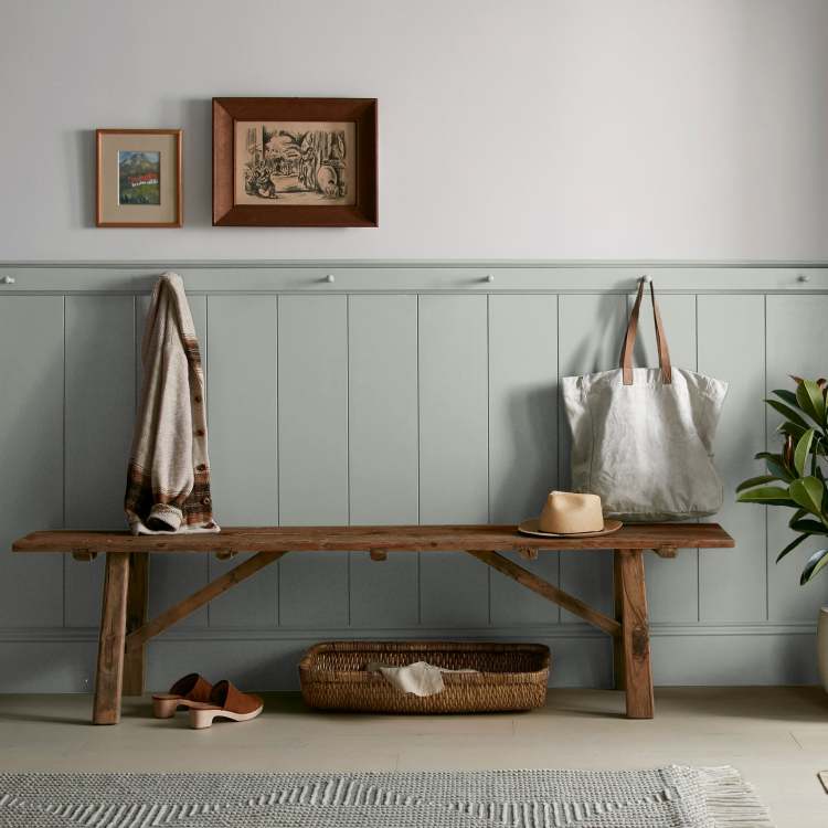 Frosty mint green with beige notes interior paint named early riser shown painted on entryway wall