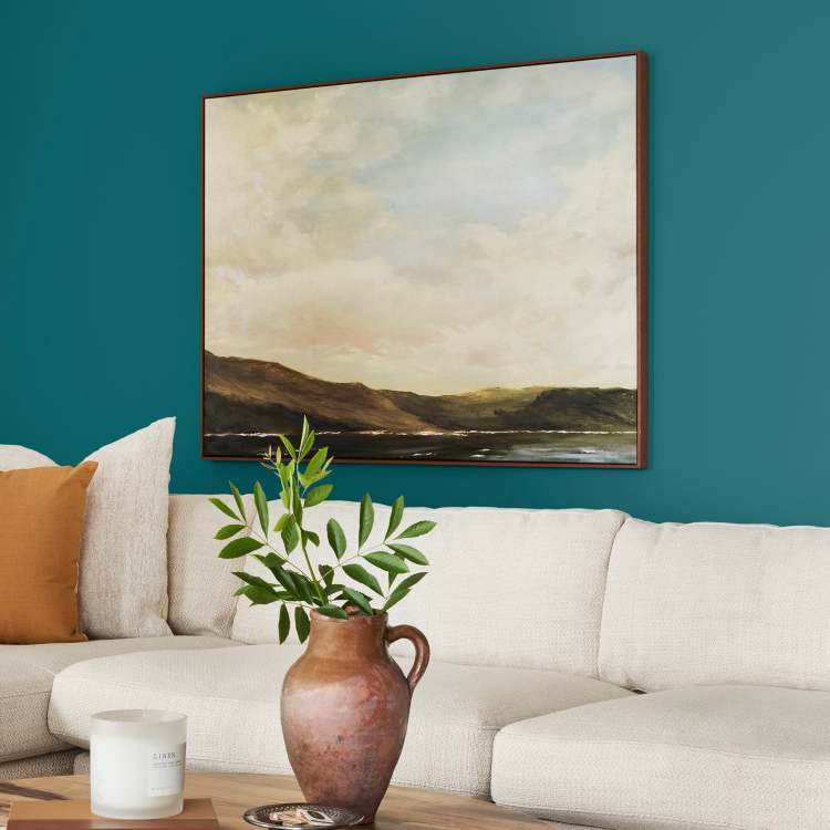 A deep peacock blue interior paint named under the stars shown painted on living room wall